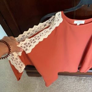 Bronze colored cold shoulder with lace top